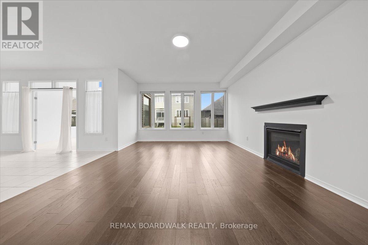 333 Haliburton Heights, Ottawa, ON - Indoor Photo Showing Living Room With Fireplace