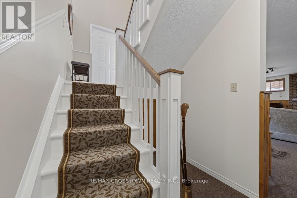 Lower stairs - 50 Withall Grove, Tiny, ON - Indoor Photo Showing Other Room