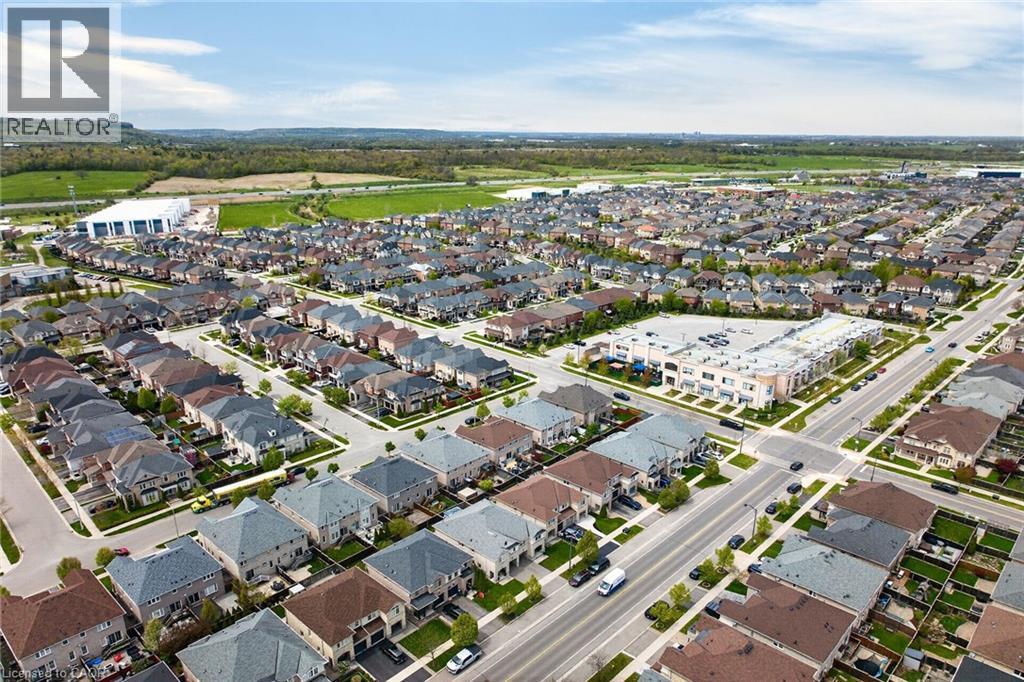 Aerial perspective showcasing a residential community with varied architectural styles - 4236 Prudham Avenue, Burlington, ON - Outdoor With View