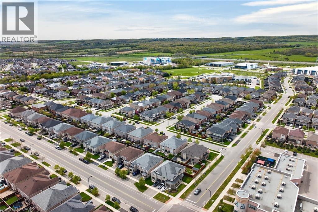 Aerial perspective showcasing a residential neighborhood with uniform street planning - 4236 Prudham Avenue, Burlington, ON - Outdoor With View