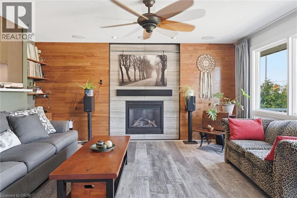 8 Delrex Boulevard, Georgetown, ON - Indoor Photo Showing Living Room With Fireplace