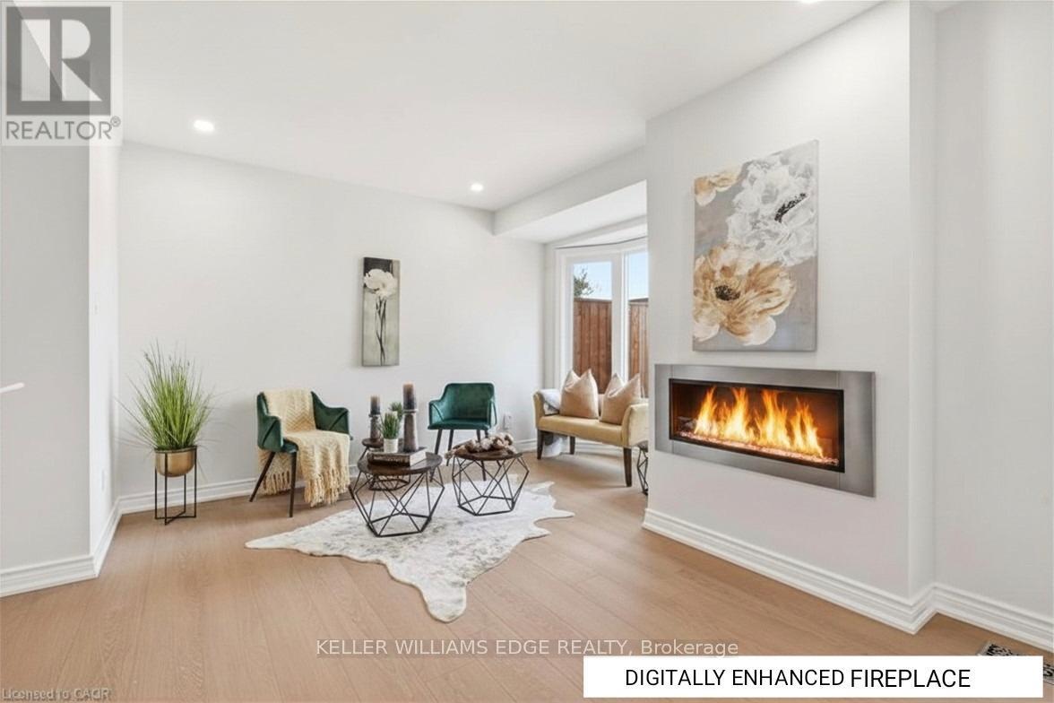 Family Room w/ Digitally Enhanced Fireplace - 14 Harbour Drive, Hamilton, ON - Indoor Photo Showing Living Room With Fireplace