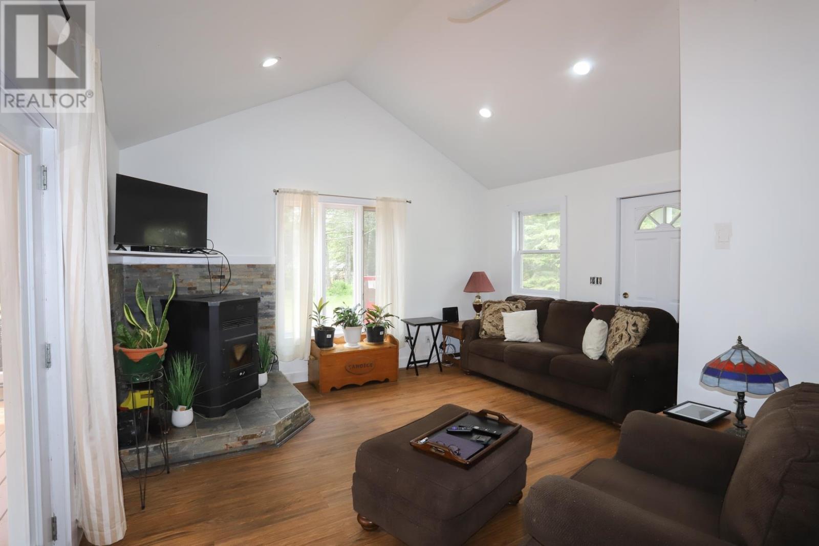 3091 Hilton Rd, Hilton Beach, ON - Indoor Photo Showing Living Room With Fireplace