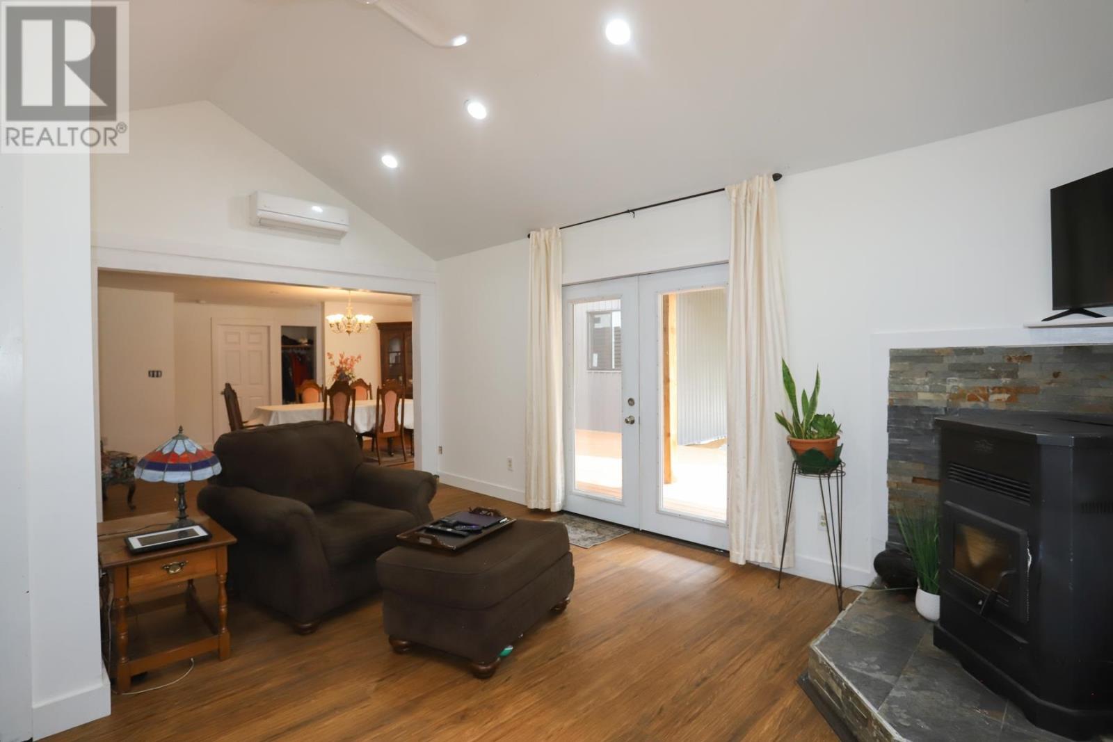 3091 Hilton Rd, Hilton Beach, ON - Indoor Photo Showing Living Room With Fireplace