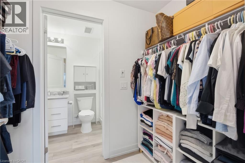 Walk-through closet - 251 Northfield Drive E Unit# 312, Waterloo, ON - Indoor With Storage