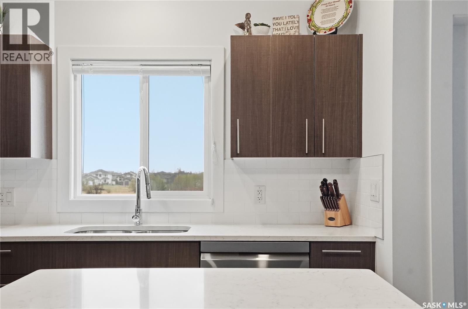 214 142 Pawlychenko Lane, Saskatoon, SK - Indoor Photo Showing Kitchen With Double Sink