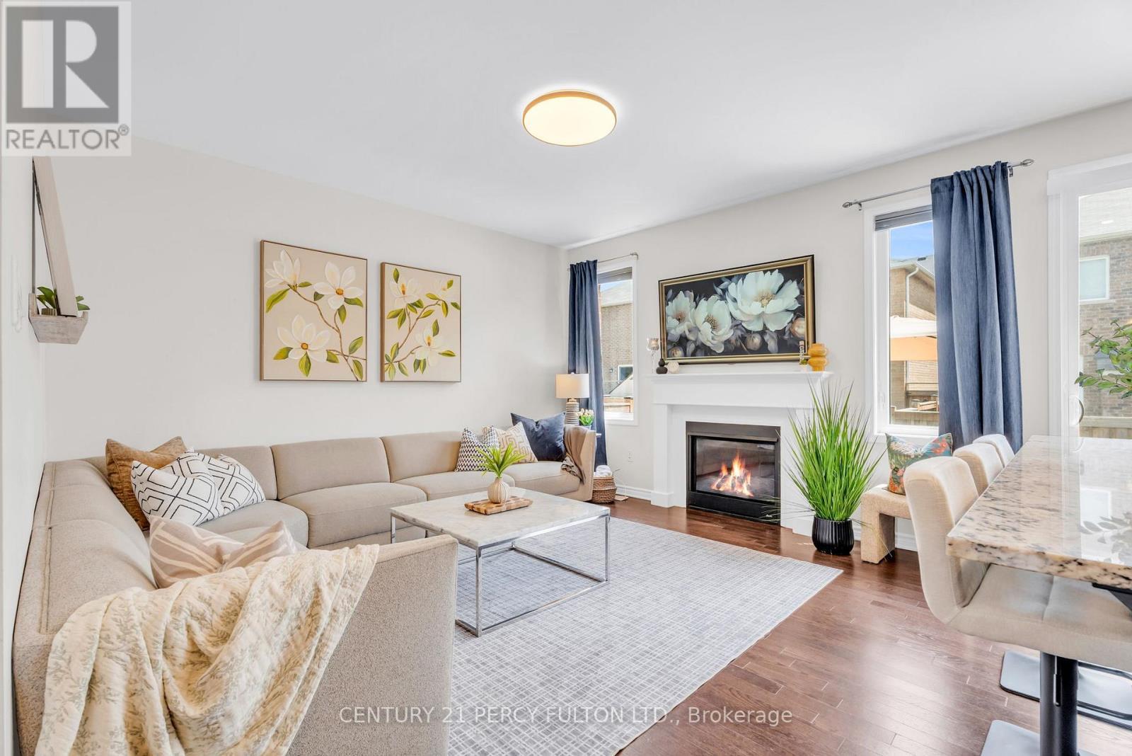 458 Etheridge Avenue, Milton, ON - Indoor Photo Showing Living Room With Fireplace
