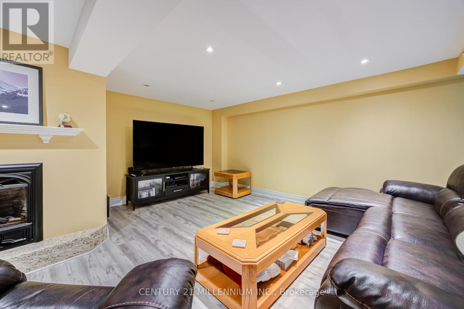 7220 Danton Promenade, Mississauga, ON - Indoor Photo Showing Living Room With Fireplace