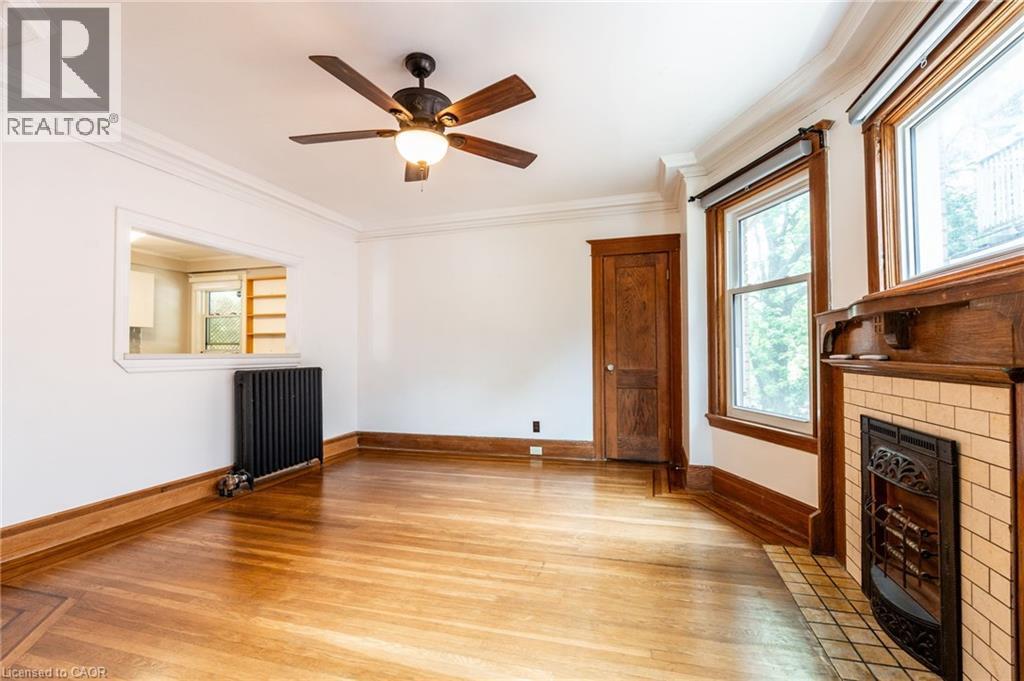 137 Sherman Avenue S, Hamilton, ON - Indoor Photo Showing Other Room With Fireplace