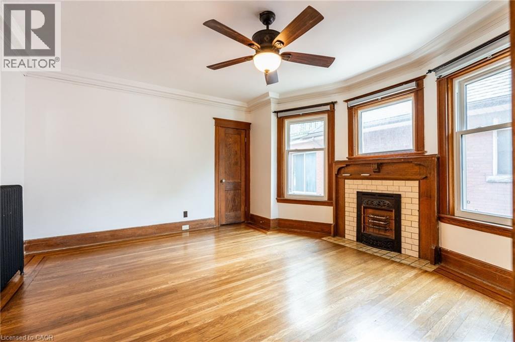137 Sherman Avenue S, Hamilton, ON - Indoor Photo Showing Other Room With Fireplace