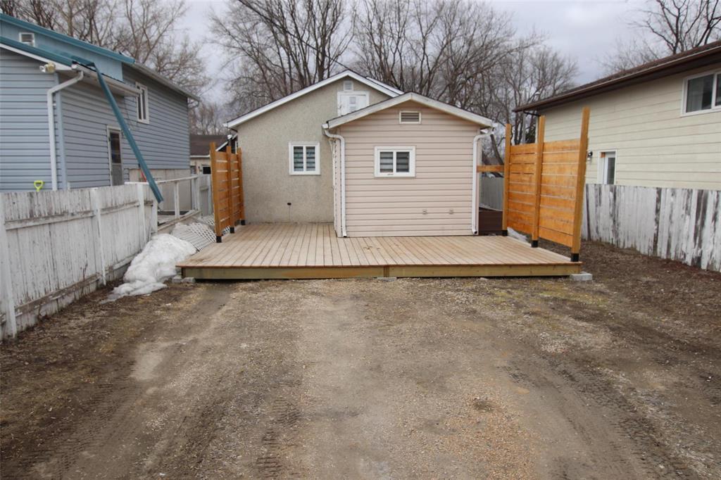Rear Deck with privacy; Rear parking - 313 Patrick Avenue, The Pas, MB - Outdoor With Exterior