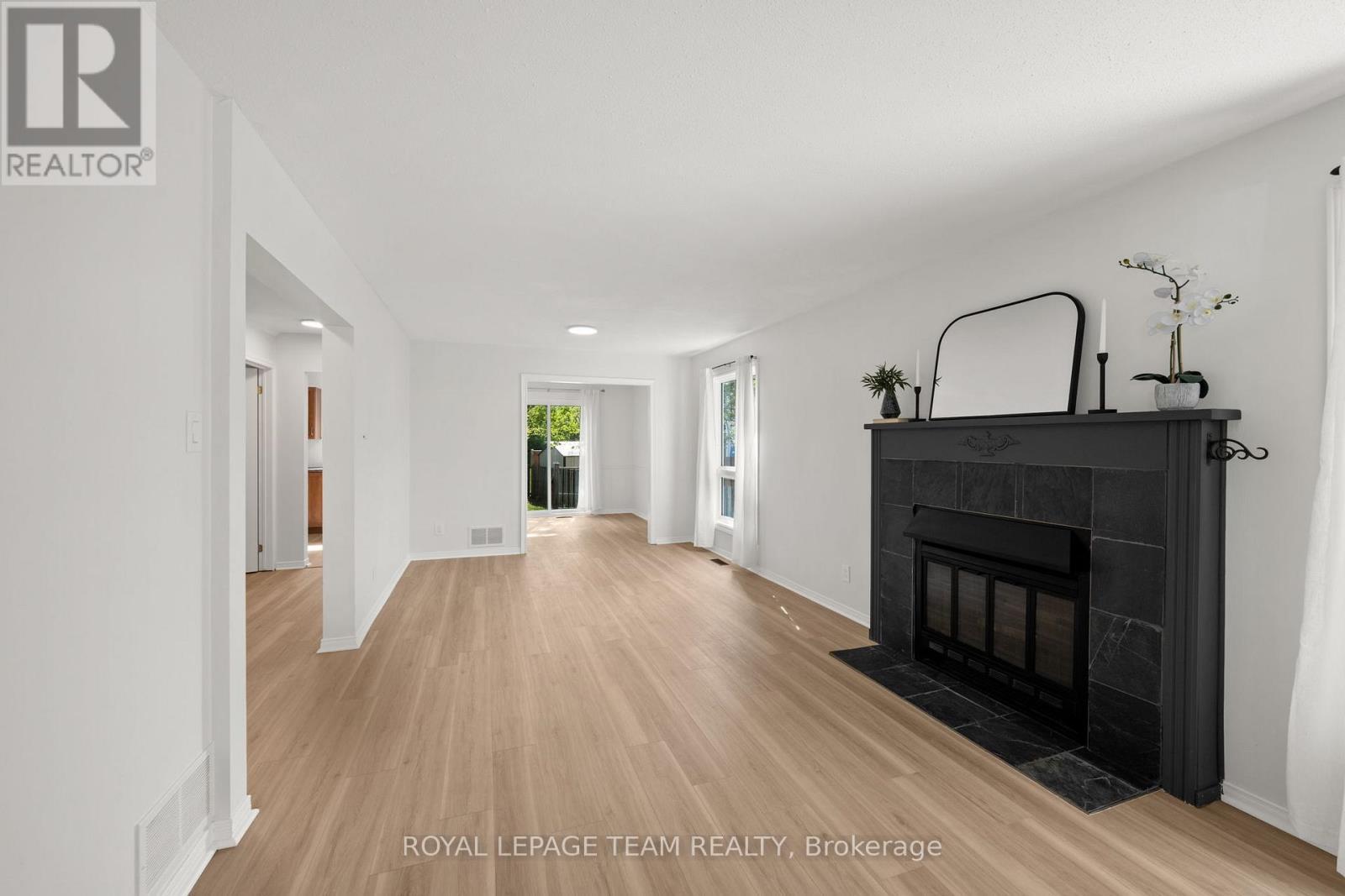 93 Hewitt Way, Ottawa, ON - Indoor Photo Showing Living Room With Fireplace