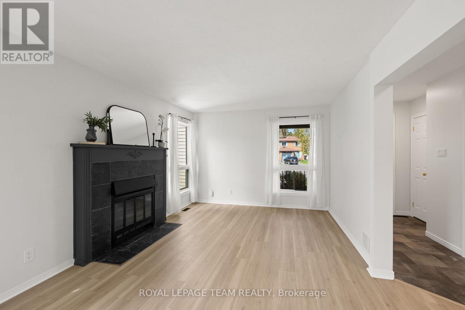 93 Hewitt Way, Ottawa, ON - Indoor Photo Showing Living Room With Fireplace