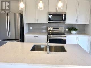 72 Campbell Crescent, Prince Edward County (Picton Ward), ON - Indoor Photo Showing Kitchen With Double Sink With Upgraded Kitchen