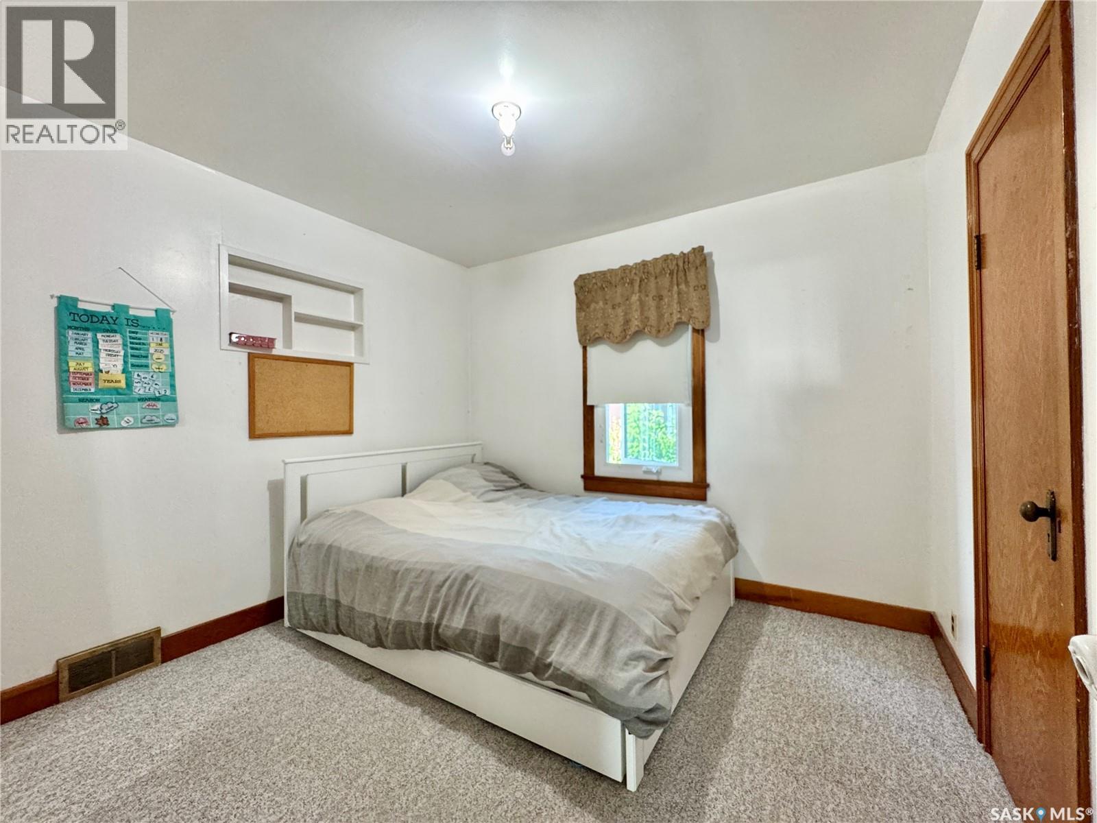 405 March Avenue E, Langenburg, SK - Indoor Photo Showing Bedroom