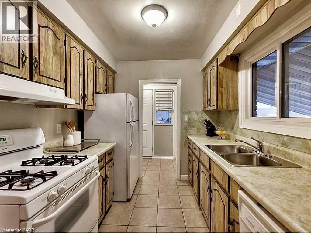 96 Manning Avenue, Hamilton, ON - Indoor Photo Showing Kitchen With Double Sink