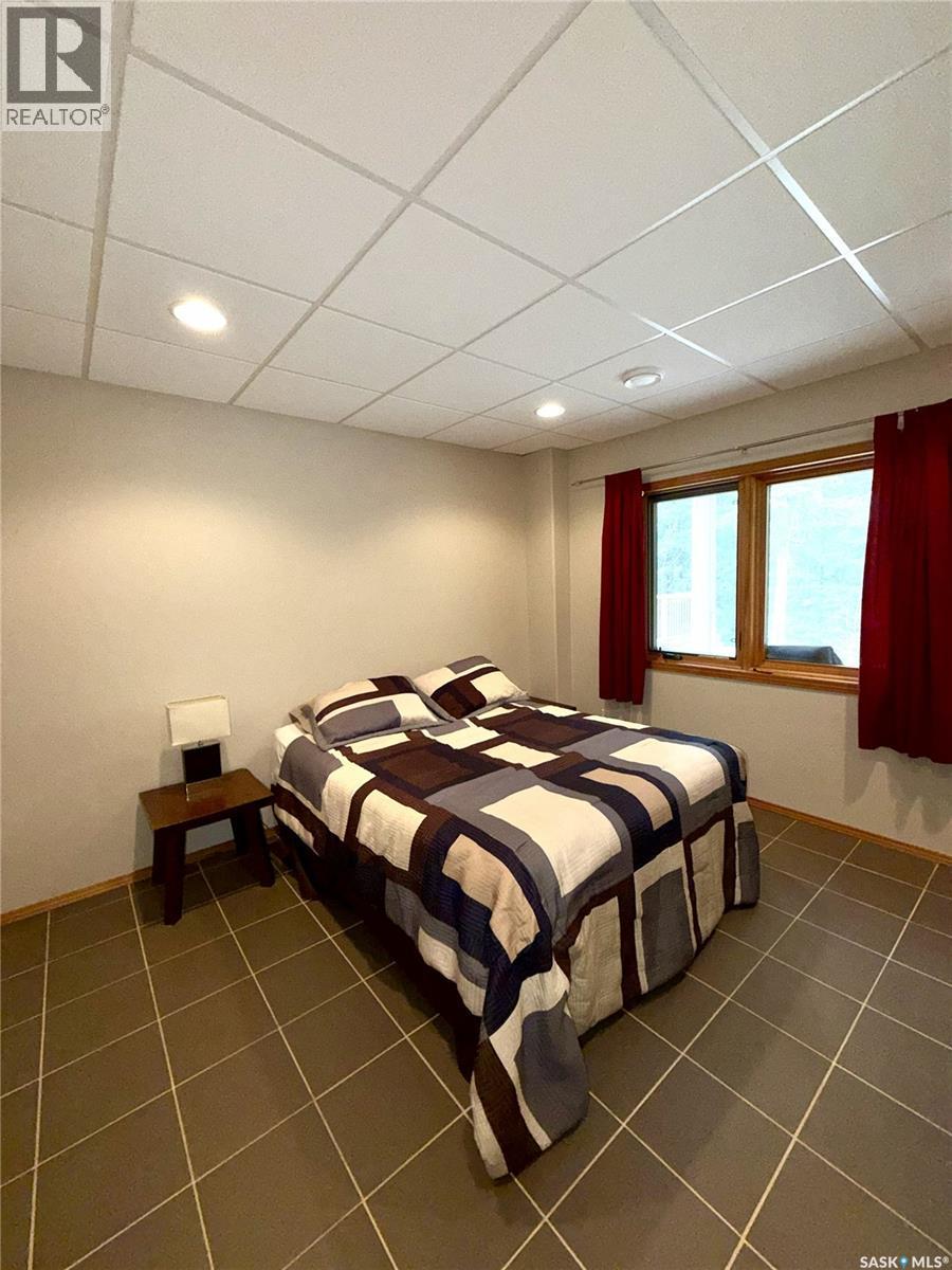 57 Estates Drive, Elk Ridge, SK - Indoor Photo Showing Bedroom