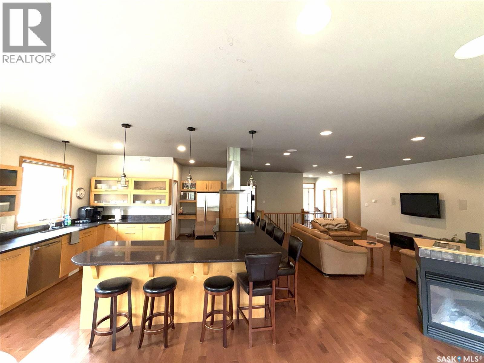 57 Estates Drive, Elk Ridge, SK - Indoor With Fireplace