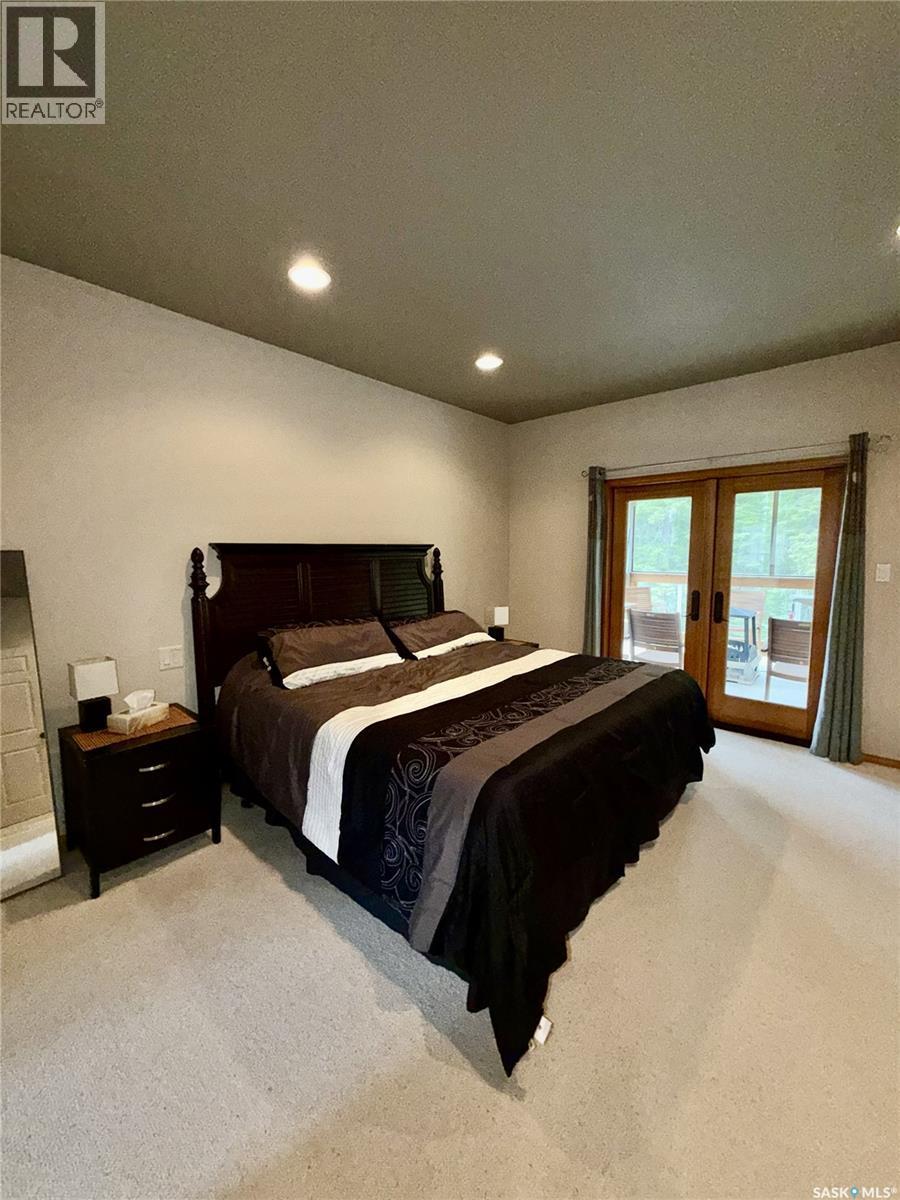 57 Estates Drive, Elk Ridge, SK - Indoor Photo Showing Bedroom