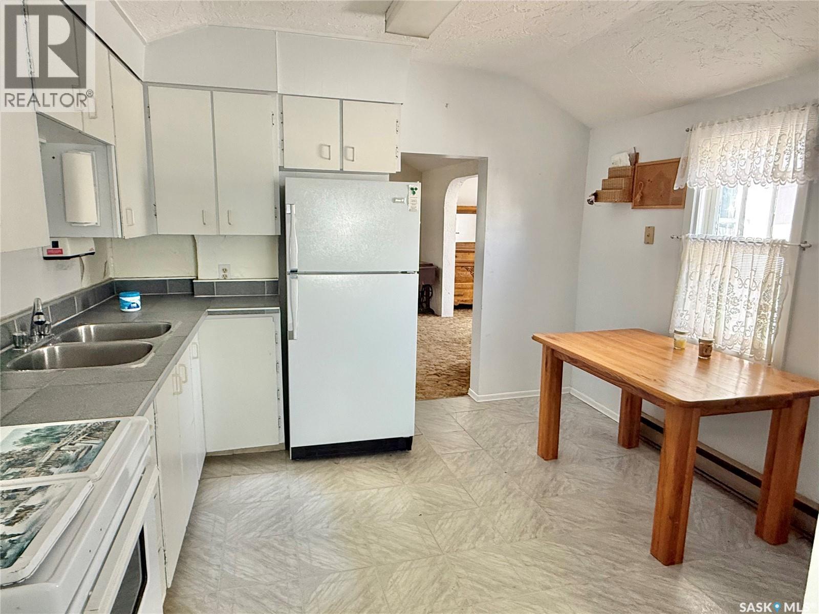 112 1St Street W, Shell Lake, SK - Indoor Photo Showing Kitchen With Double Sink