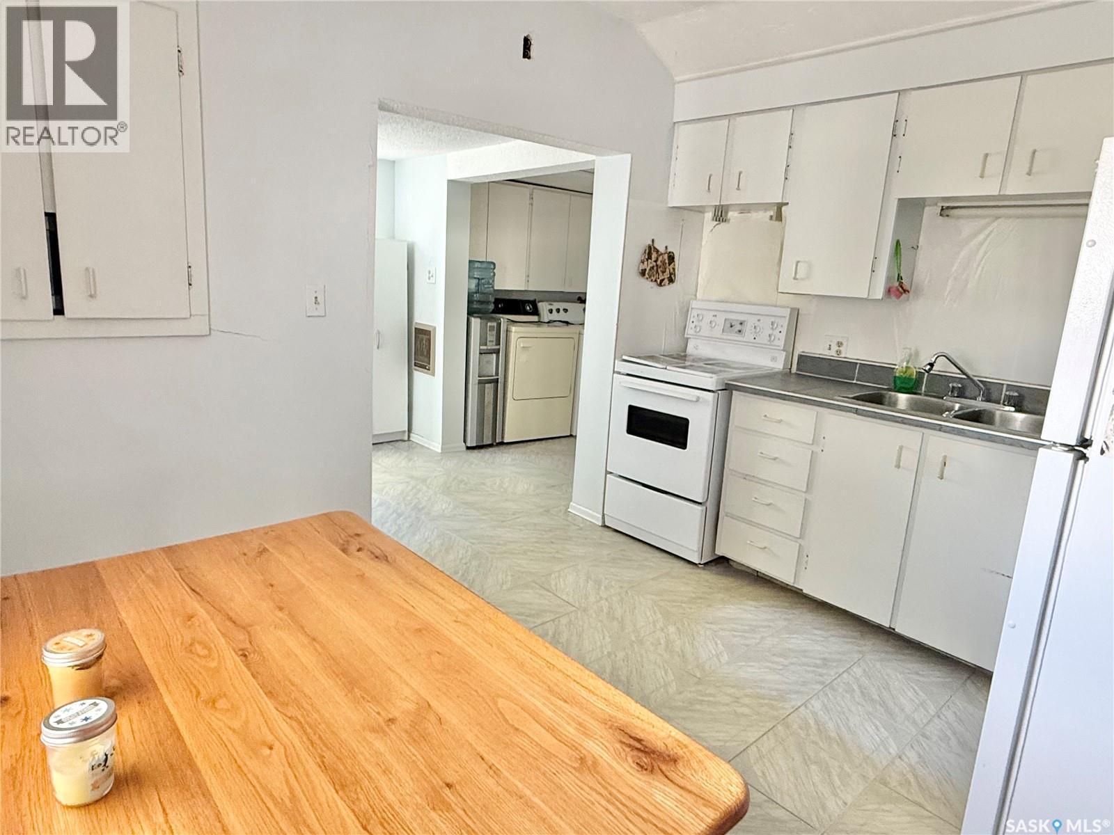 112 1St Street W, Shell Lake, SK - Indoor Photo Showing Kitchen With Double Sink