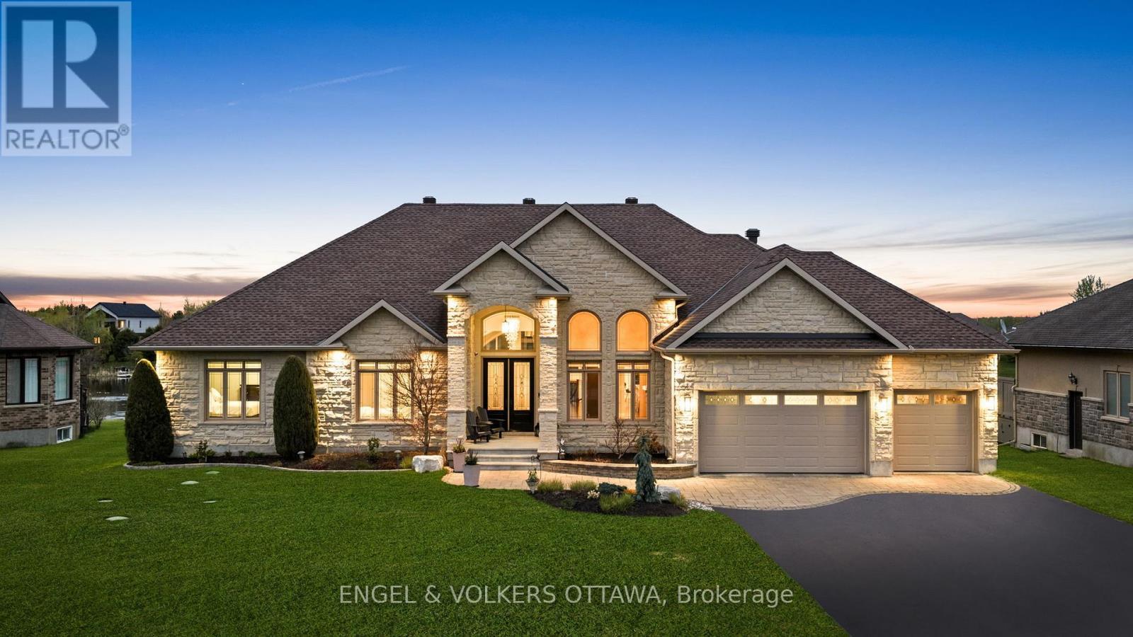 Lawn has been digitally enhanced - 1457 Waters Edge Way, Ottawa, ON - Outdoor With Facade
