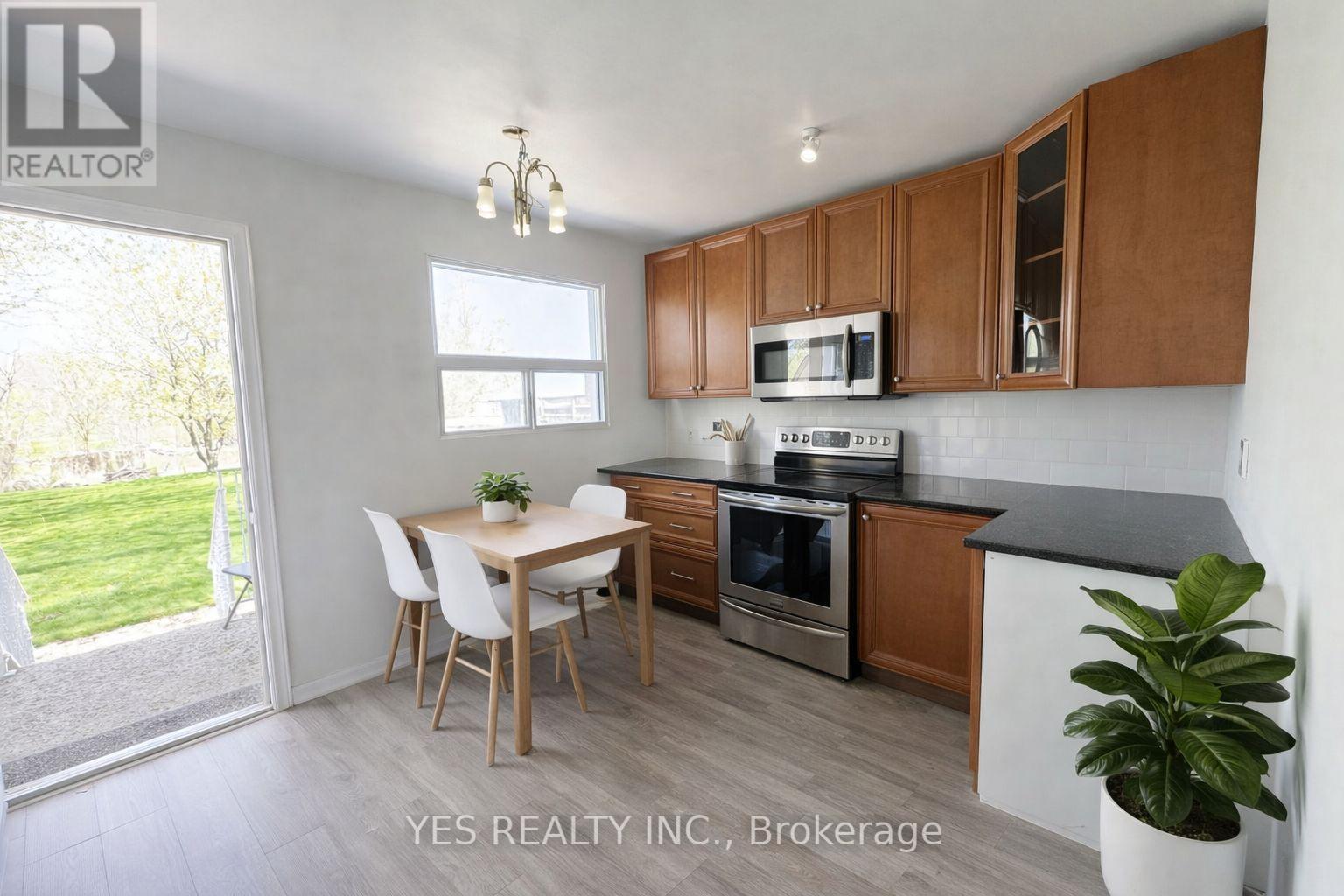 Virtually staged Image - 199 North Service Road, Mississauga, ON - Indoor Photo Showing Kitchen
