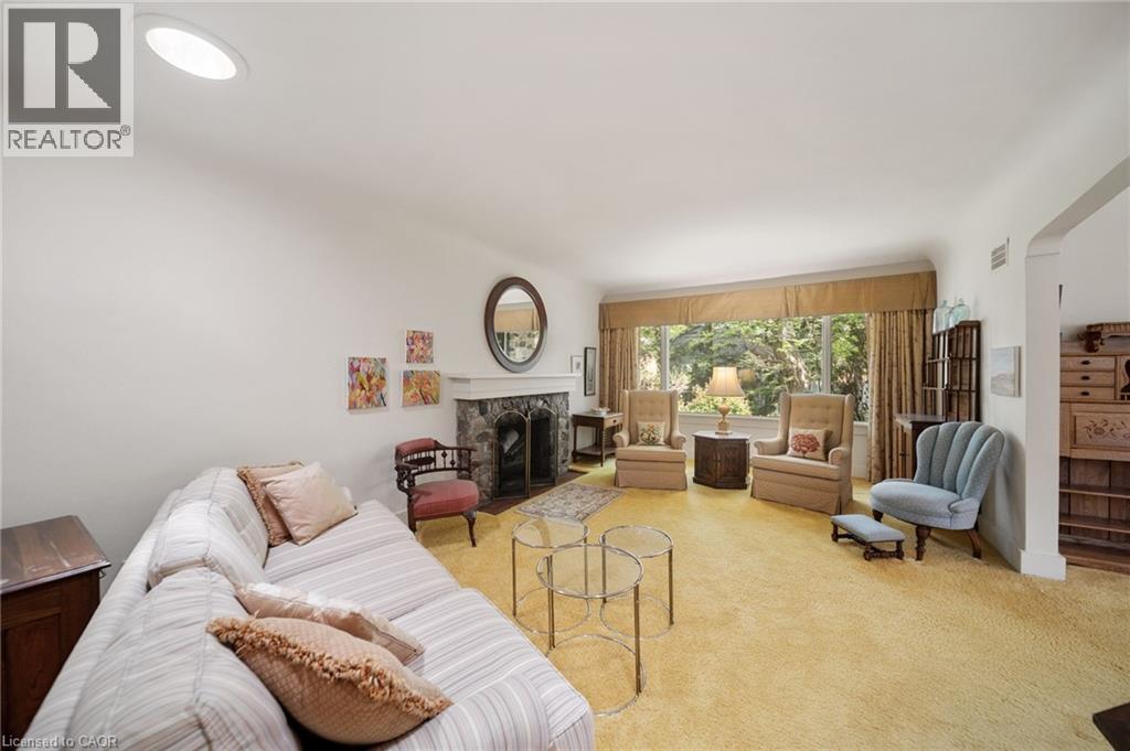 133 Mccall Crescent, Simcoe, ON - Indoor Photo Showing Living Room With Fireplace