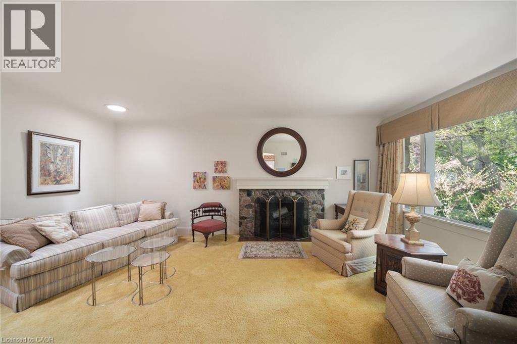 133 Mccall Crescent, Simcoe, ON - Indoor Photo Showing Living Room With Fireplace