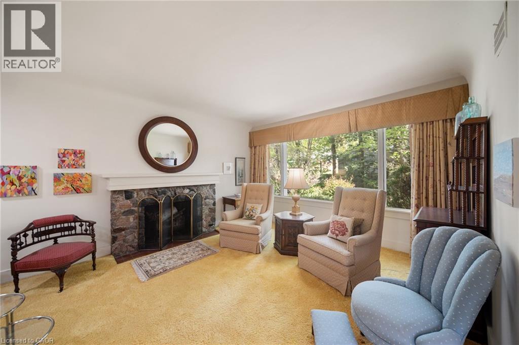 133 Mccall Crescent, Simcoe, ON - Indoor Photo Showing Living Room With Fireplace