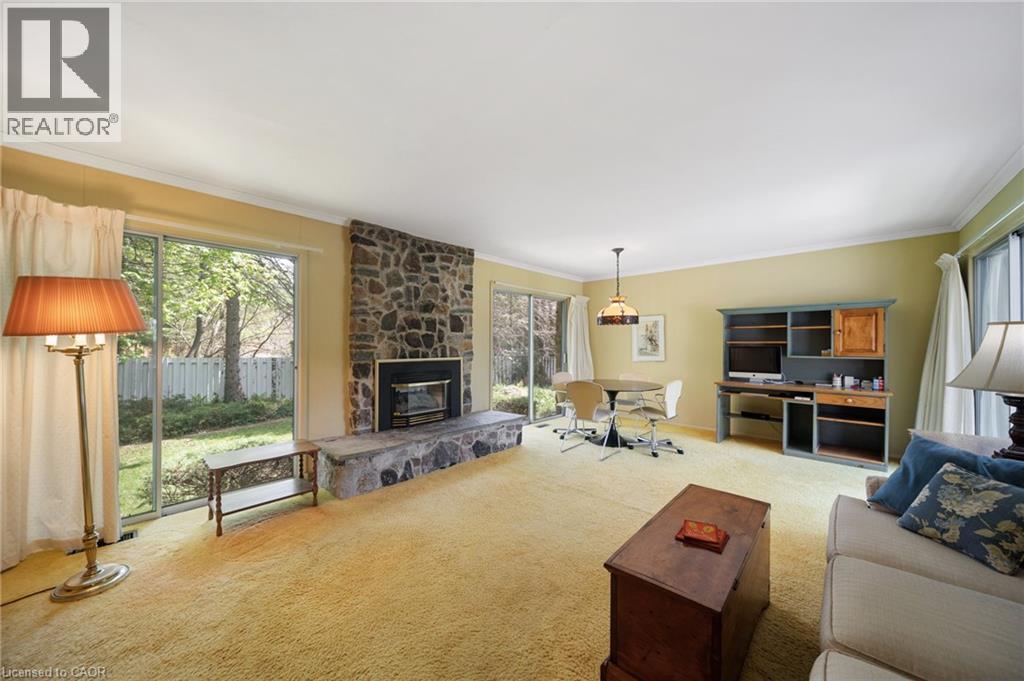 133 Mccall Crescent, Simcoe, ON - Indoor Photo Showing Living Room With Fireplace