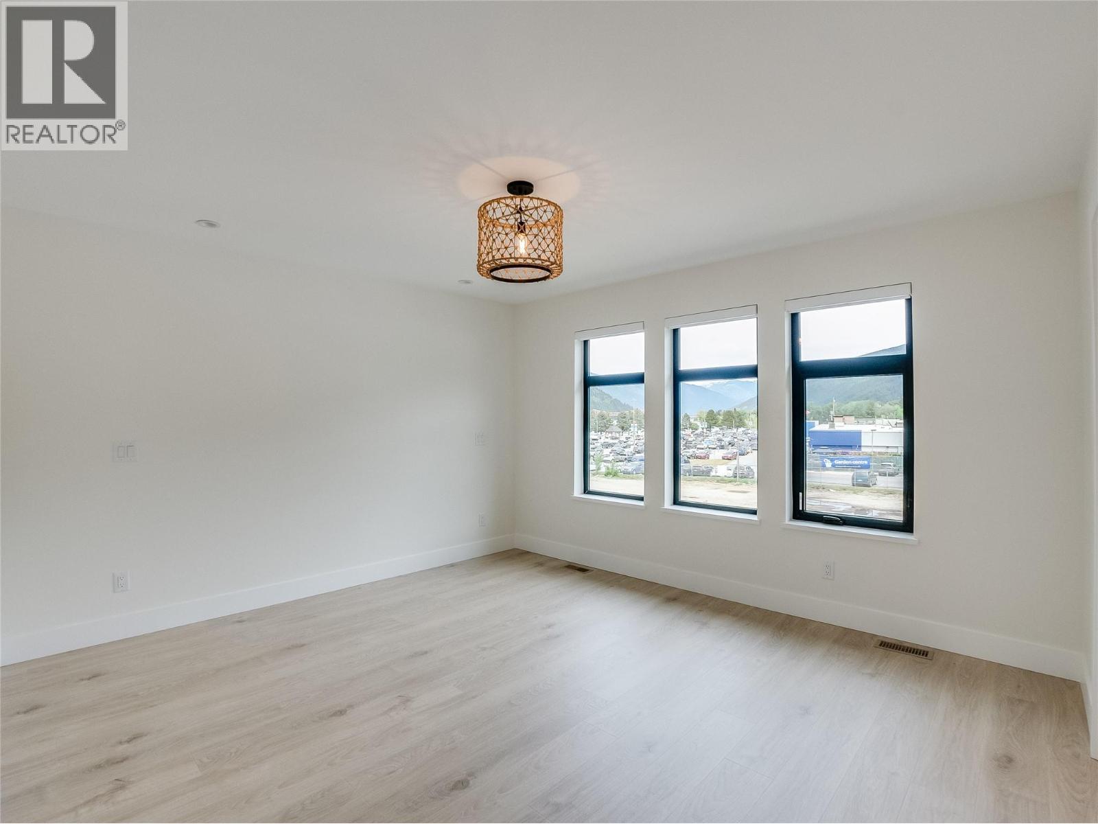 Master/primary bedroom - 910 Lakeside Drive Unit# 208, Nelson, BC - Indoor Photo Showing Other Room