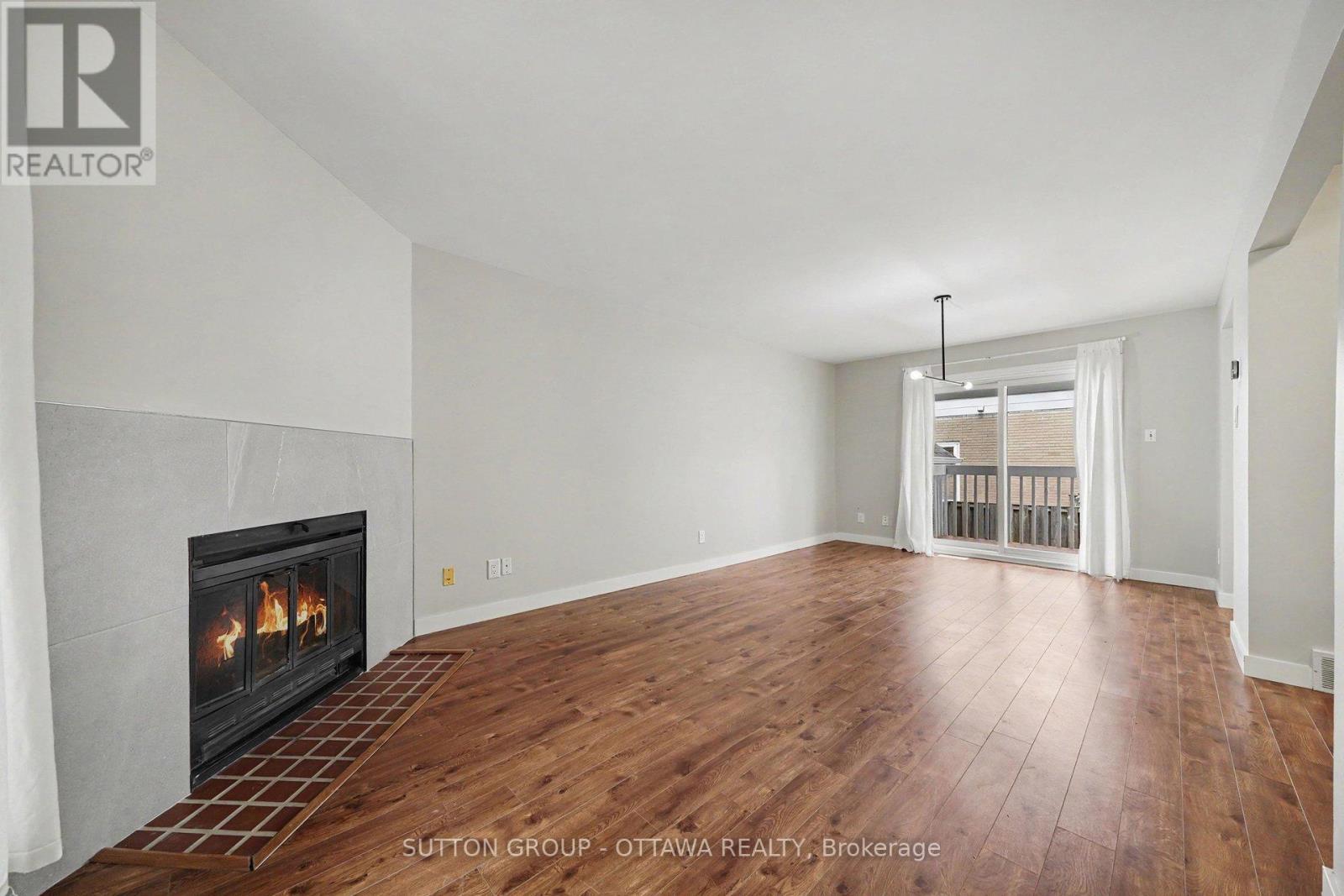 73 Scrivens Street, Ottawa, ON - Indoor Photo Showing Living Room With Fireplace