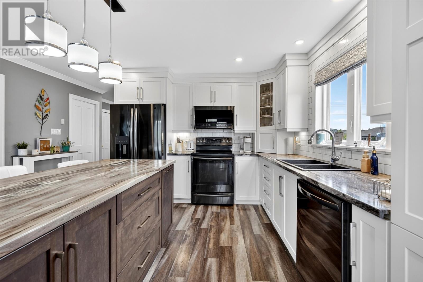 ground level in-law suite - 46 Remembrance Loop, Carbonear, NL - Indoor Photo Showing Kitchen With Double Sink