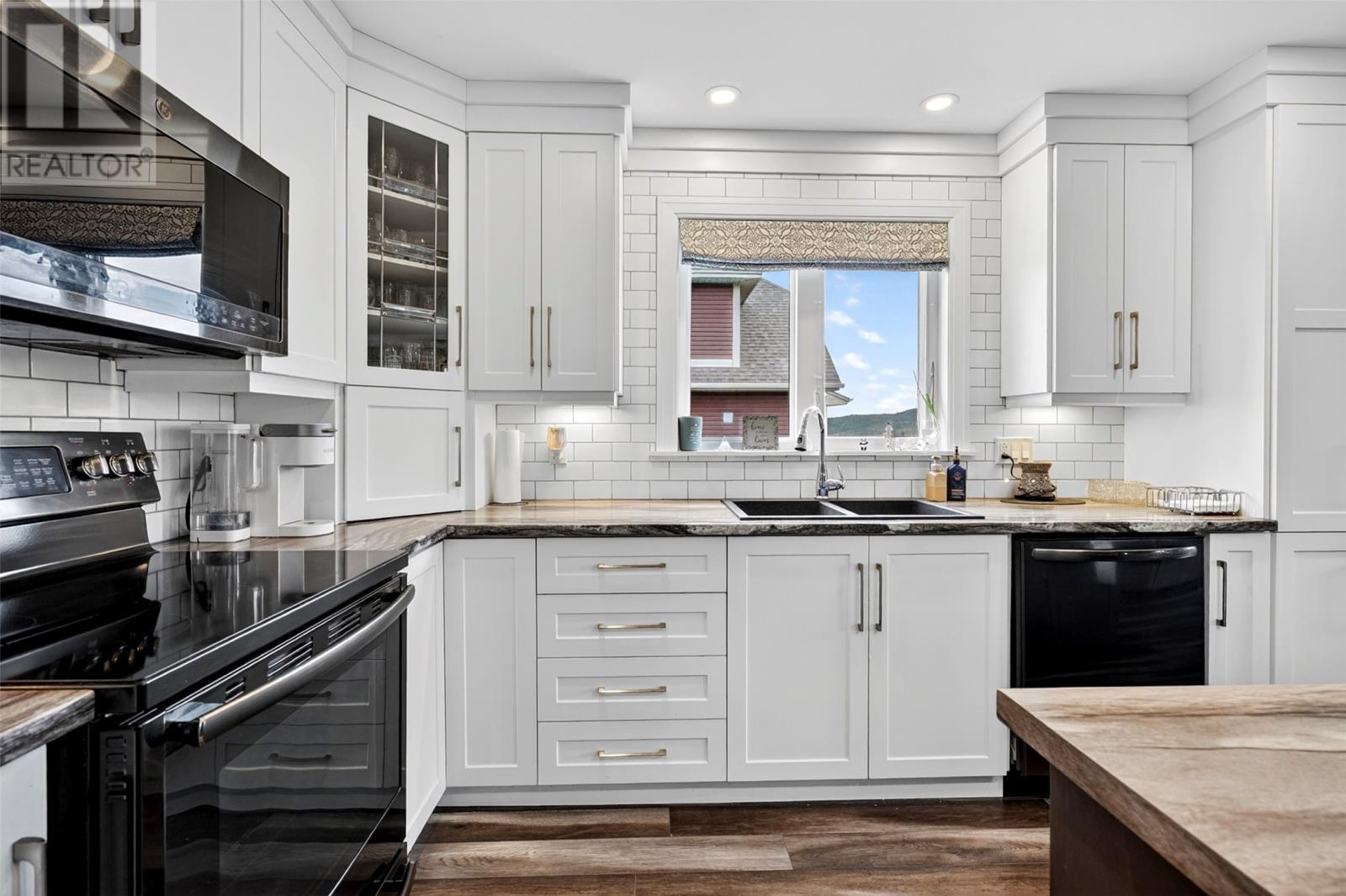 ground level in-law suite - 46 Remembrance Loop, Carbonear, NL - Indoor Photo Showing Kitchen With Double Sink With Upgraded Kitchen