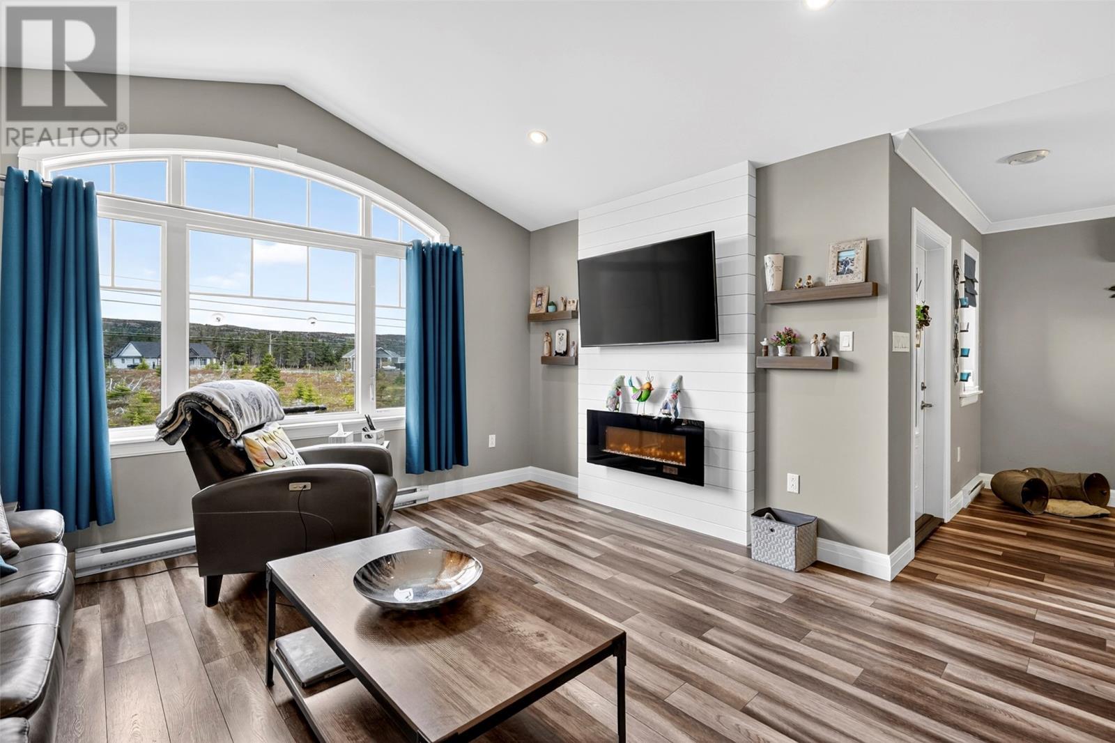 upper level living room - 46 Remembrance Loop, Carbonear, NL - Indoor Photo Showing Living Room With Fireplace