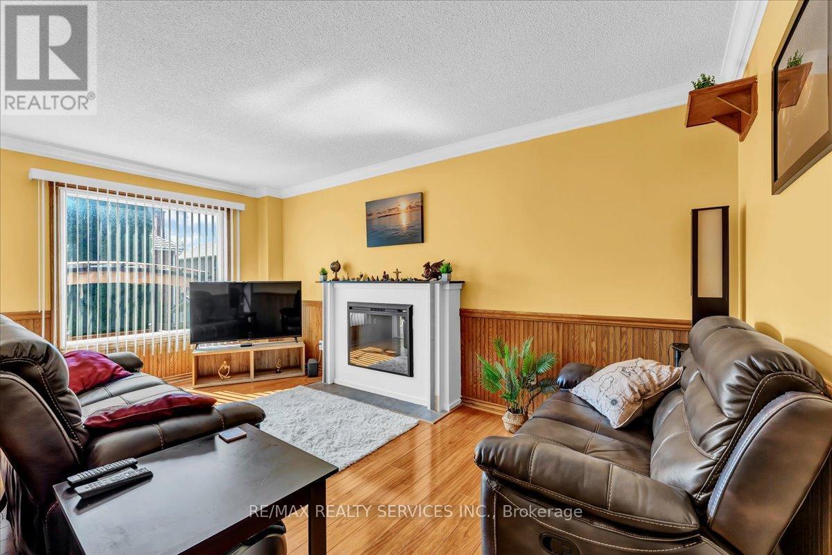 108 Candy Crescent, Brampton, ON - Indoor Photo Showing Living Room With Fireplace