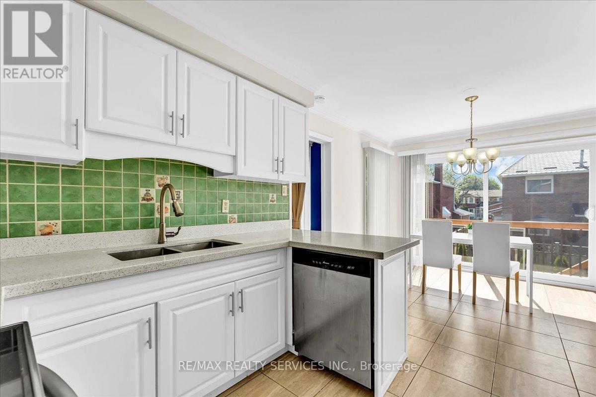 108 Candy Crescent, Brampton, ON - Indoor Photo Showing Kitchen With Double Sink