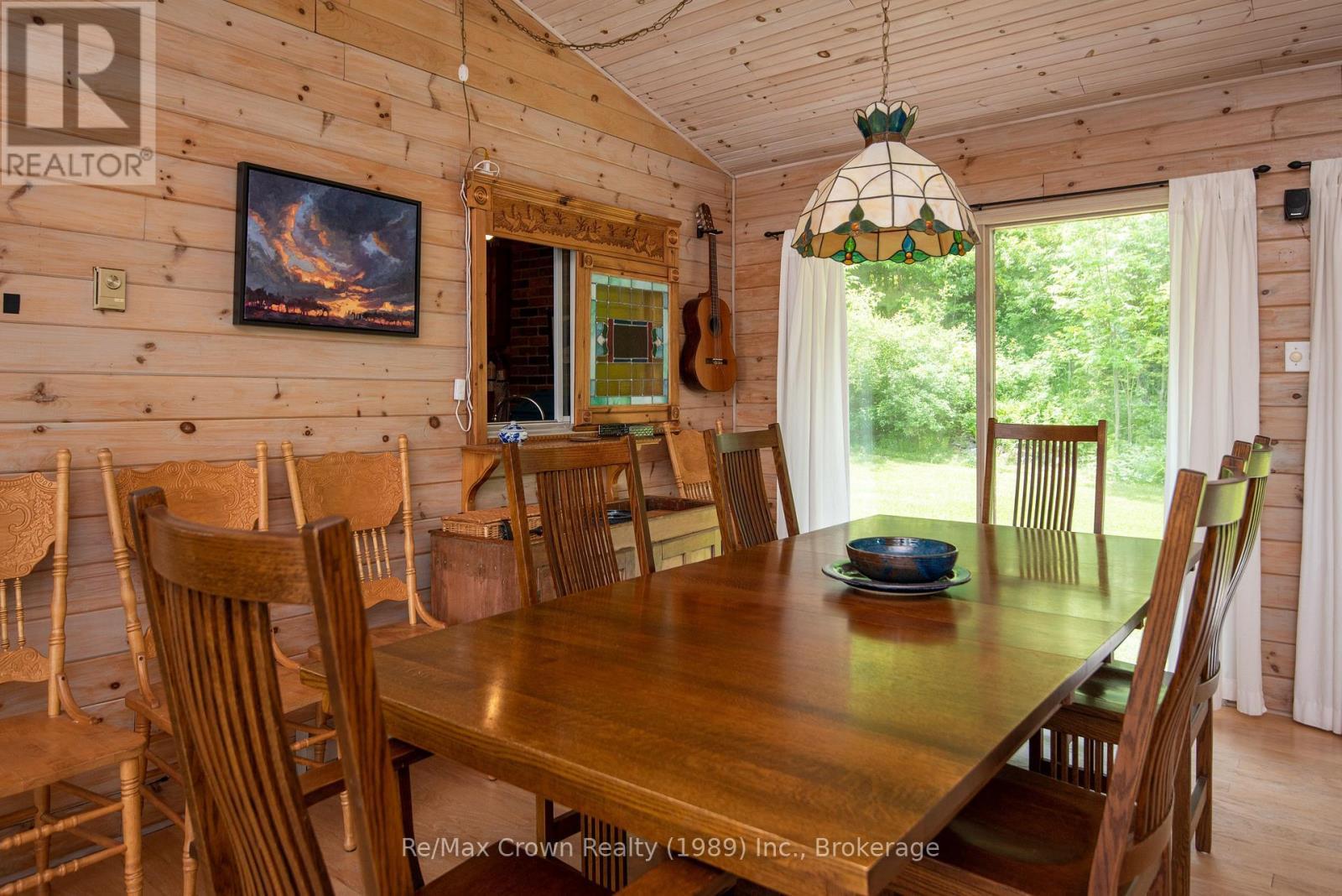 Dining area w/pass through window to kitchen - 294 Everett Drive, Parry Sound Remote Area (Restoule), ON - Indoor Photo Showing Dining Room