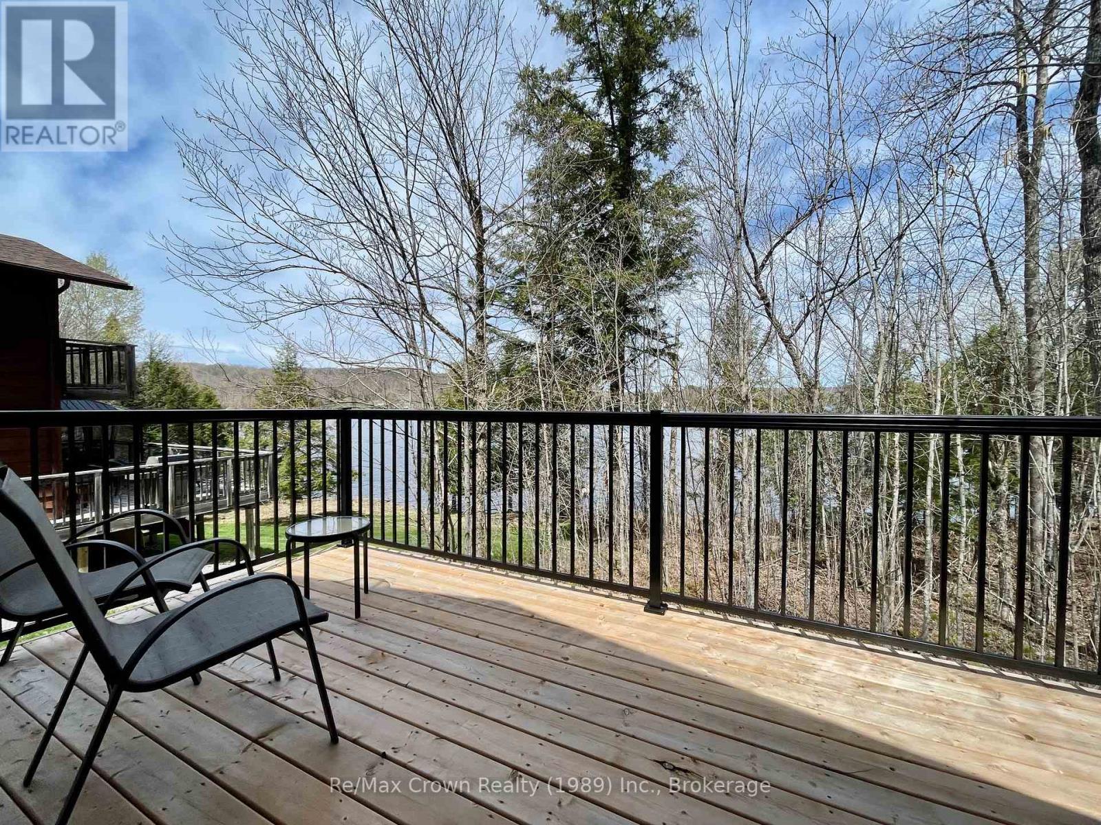 Bunkie sun deck - 294 Everett Drive, Parry Sound Remote Area (Restoule), ON - Outdoor With Balcony