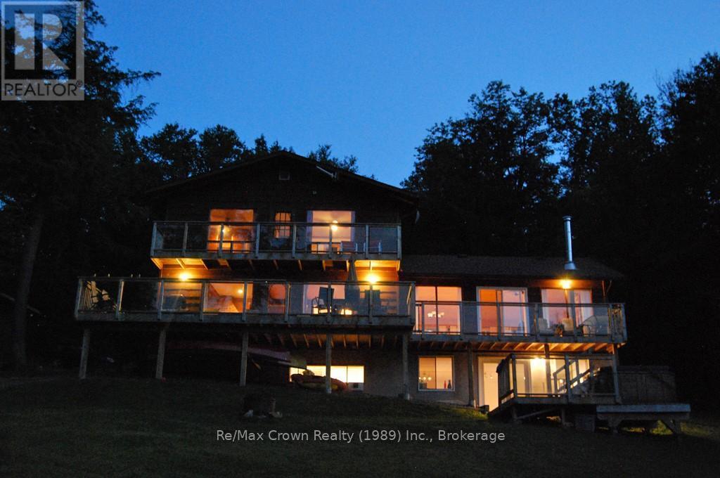 Night view - 294 Everett Drive, Parry Sound Remote Area (Restoule), ON - Outdoor With Balcony