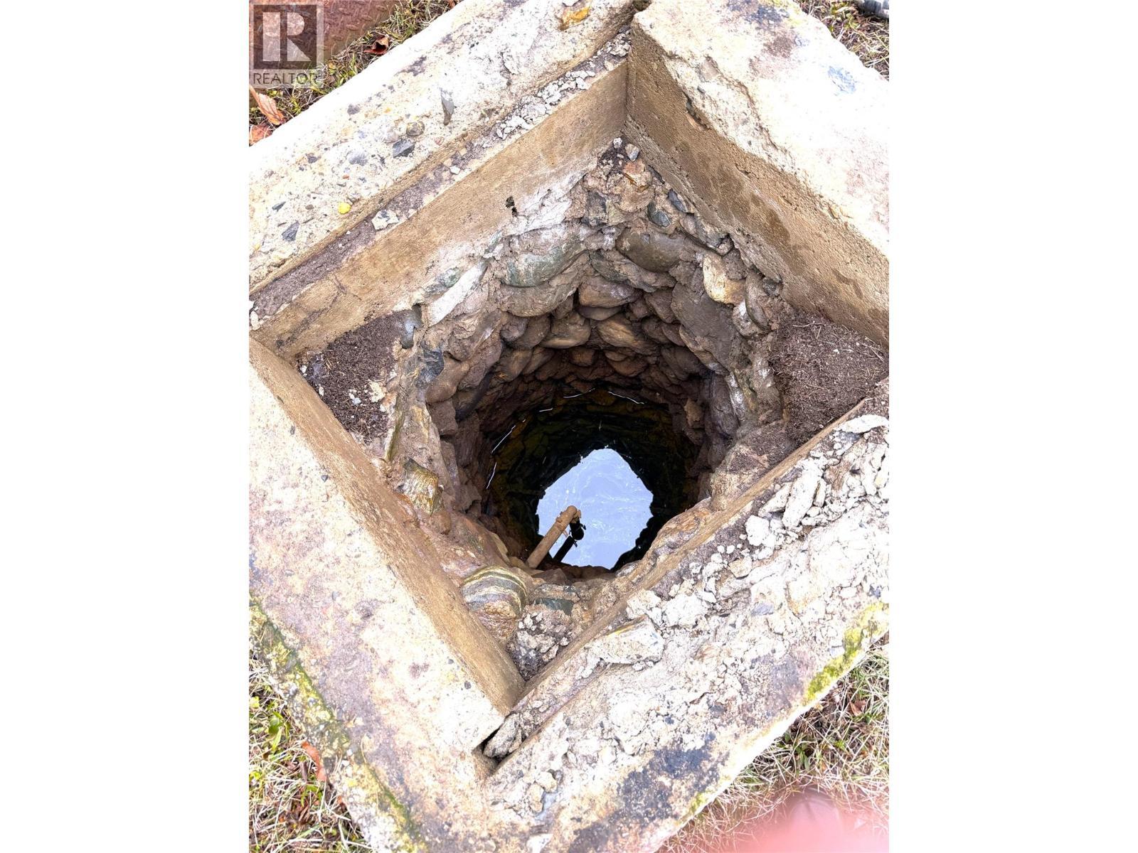 Original dug well beside 1936 Farmhouse - 1403 Notch Hill Road, Sorrento, BC