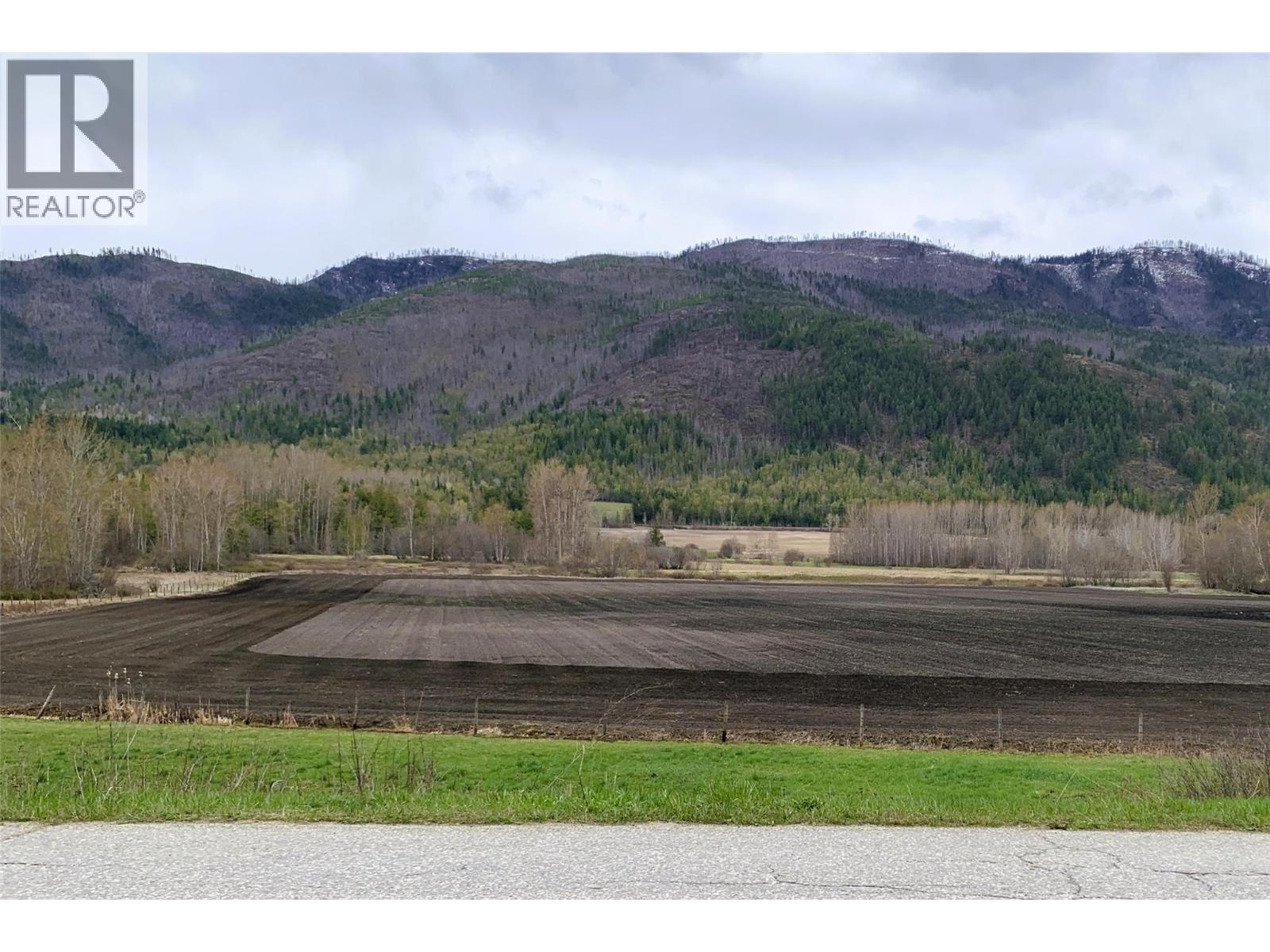 Cultivated valley field in April 2026 - 1403 Notch Hill Road, Sorrento, BC