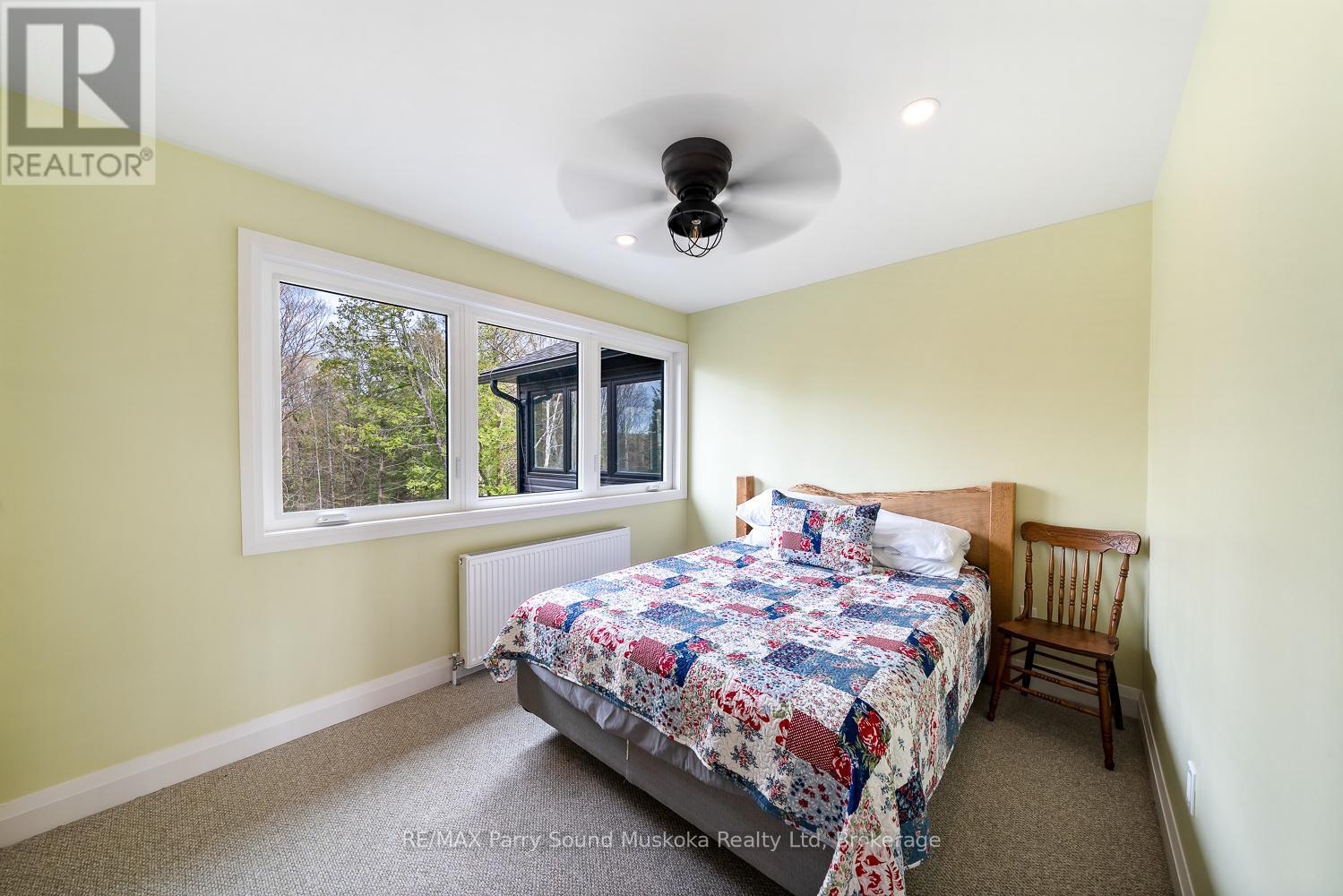 13 Labrash Lake Road, Whitestone, ON - Indoor Photo Showing Bedroom