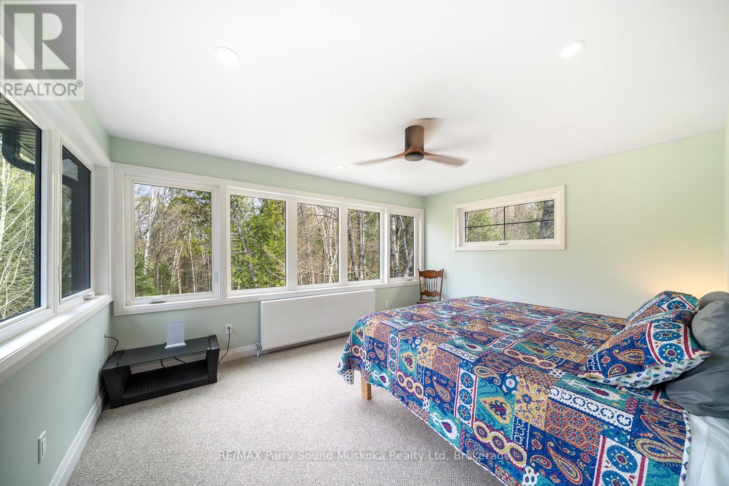13 Labrash Lake Road, Whitestone, ON - Indoor Photo Showing Bedroom
