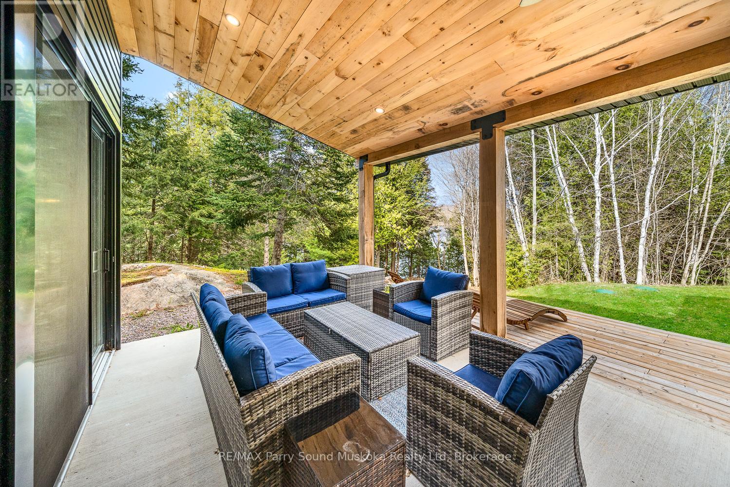 13 Labrash Lake Road, Whitestone, ON - Outdoor With Deck Patio Veranda With Exterior