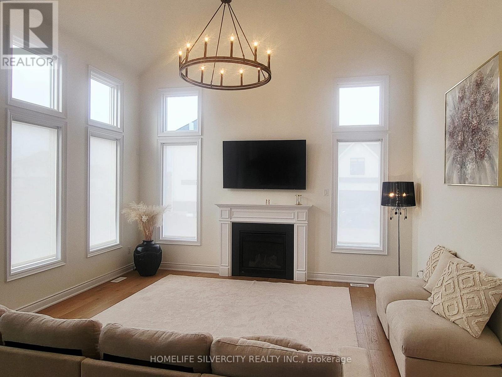 22 Ewing Way, Amaranth, ON - Indoor Photo Showing Living Room With Fireplace
