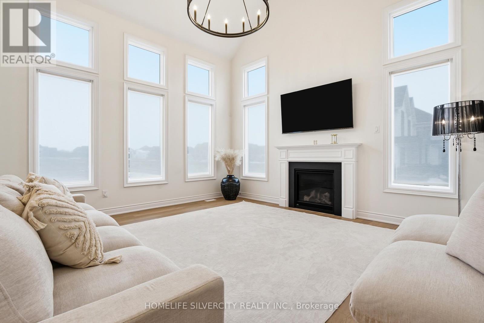 22 Ewing Way, Amaranth, ON - Indoor Photo Showing Living Room With Fireplace