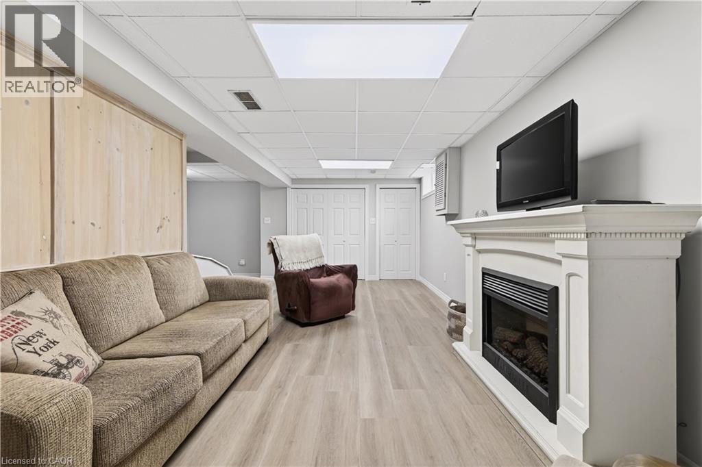 108 Old Forest Crescent, Kitchener, ON - Indoor Photo Showing Living Room With Fireplace