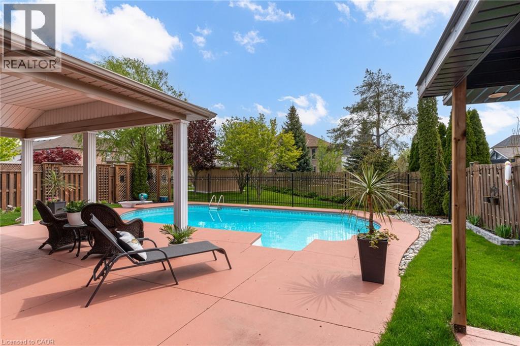 82 Vansickle Road, St. Catharines, ON - Outdoor With In Ground Pool With Deck Patio Veranda With Backyard